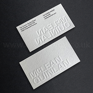 Embossed business cards with black print