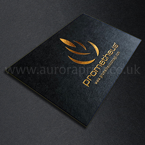 Bright metallic gold foil on a matt black business card