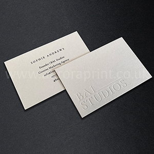 Debossed business cards with black foil print
